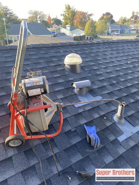 drain cleaning service on the roof