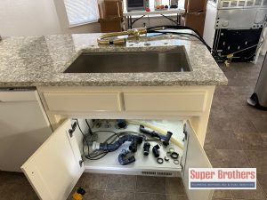 main picture replacing kitchen sink pipes