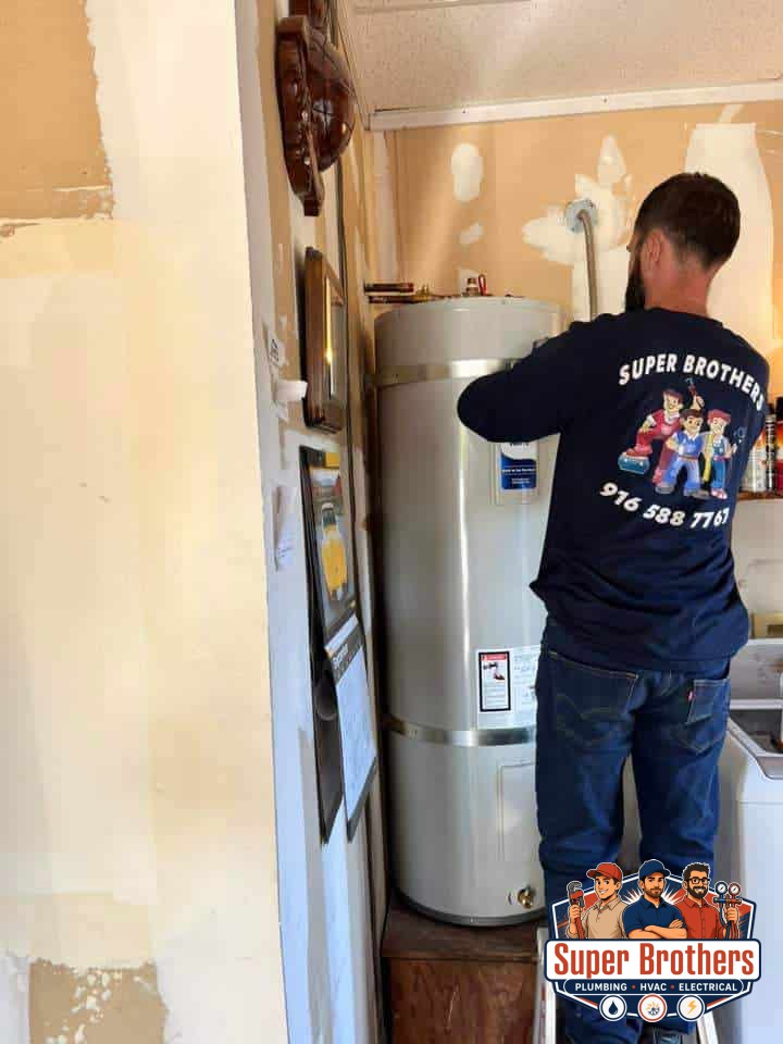 plumbing technician replacing the water heater