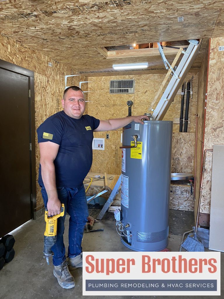 plumbing professional installing the water heater