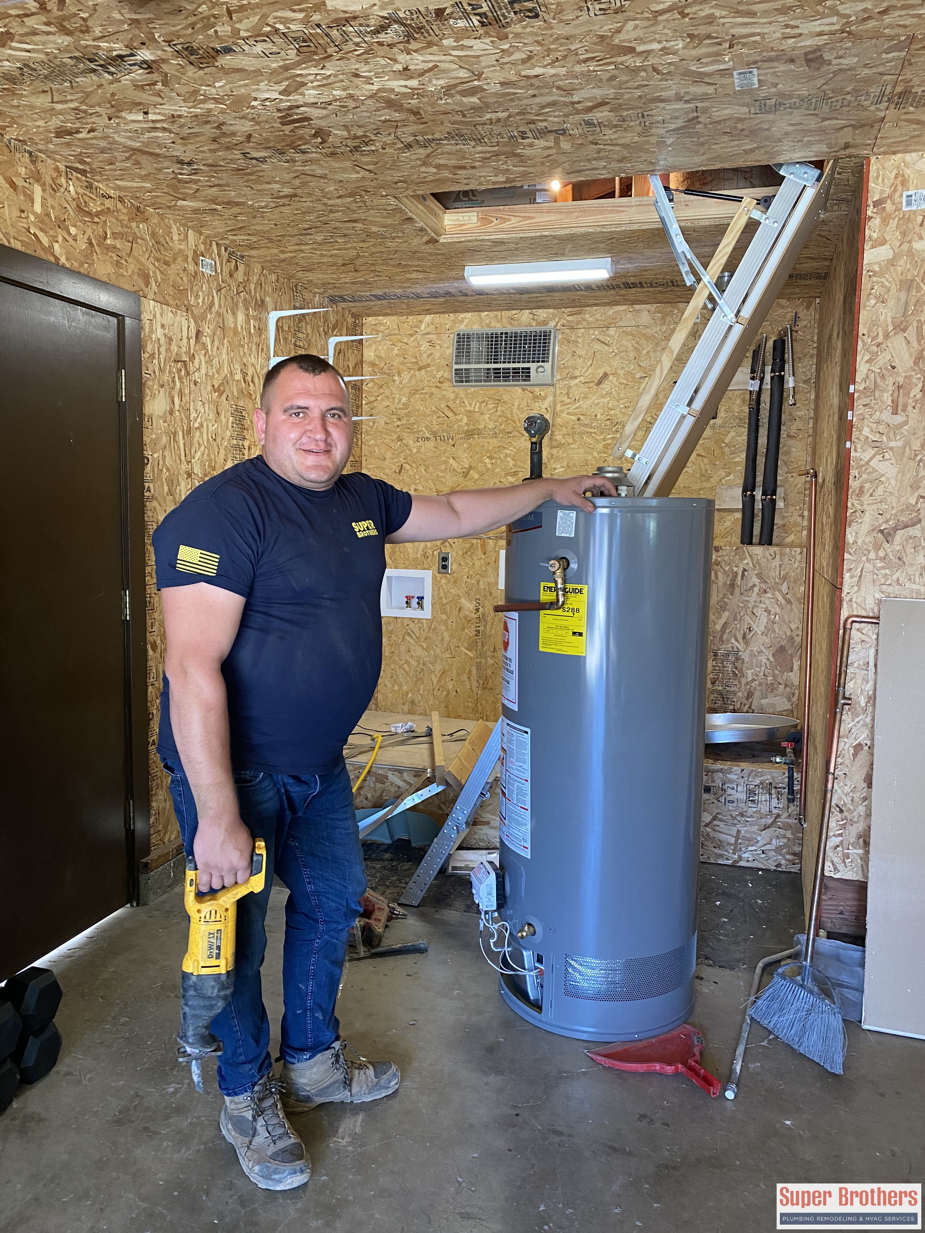 Plumbing professional installing a residential water heater