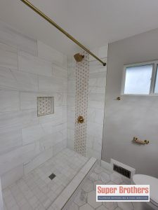 bathroom remodeling with white marble tiles