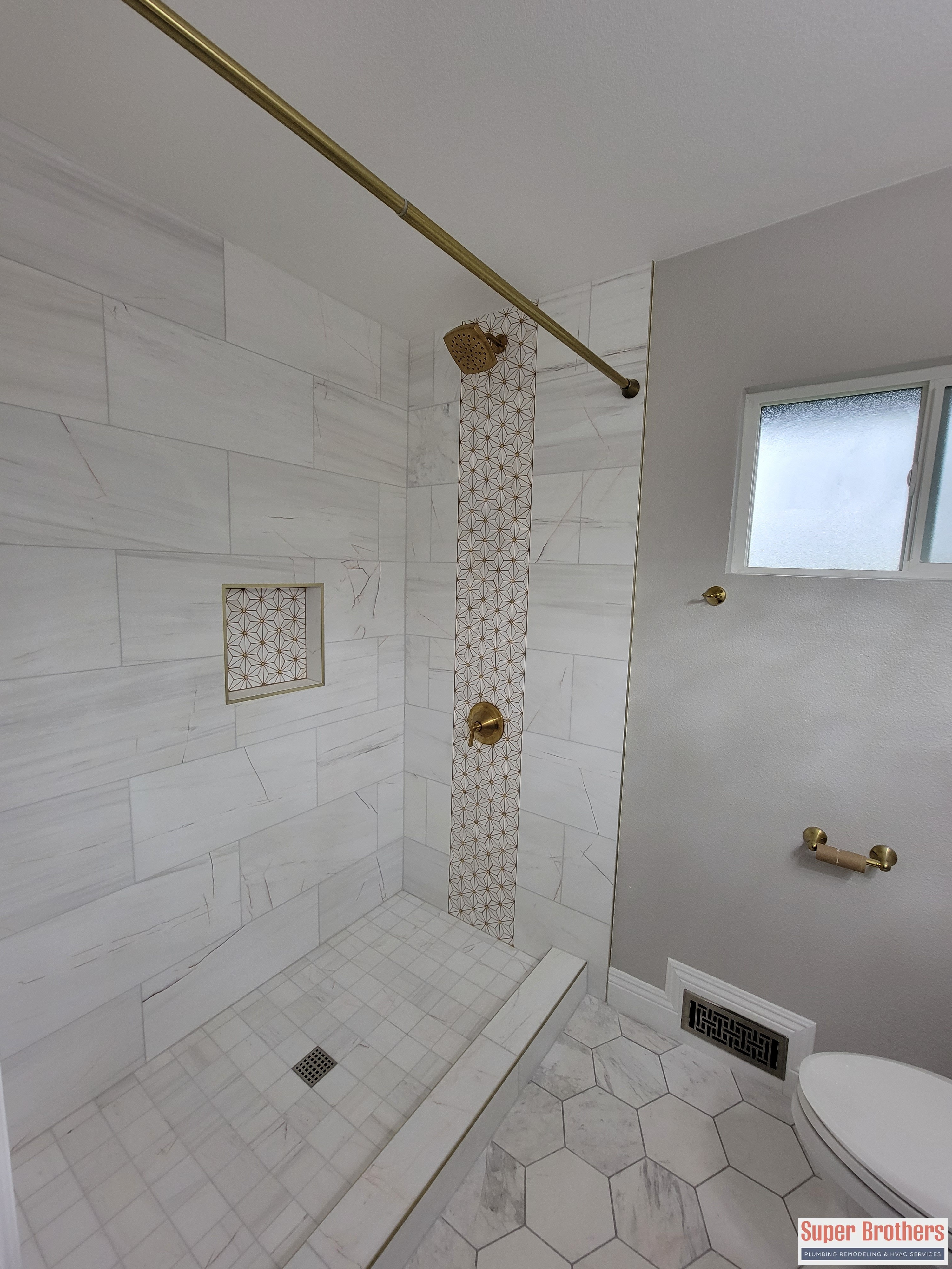 bathroom remodeling with white marble tiles
