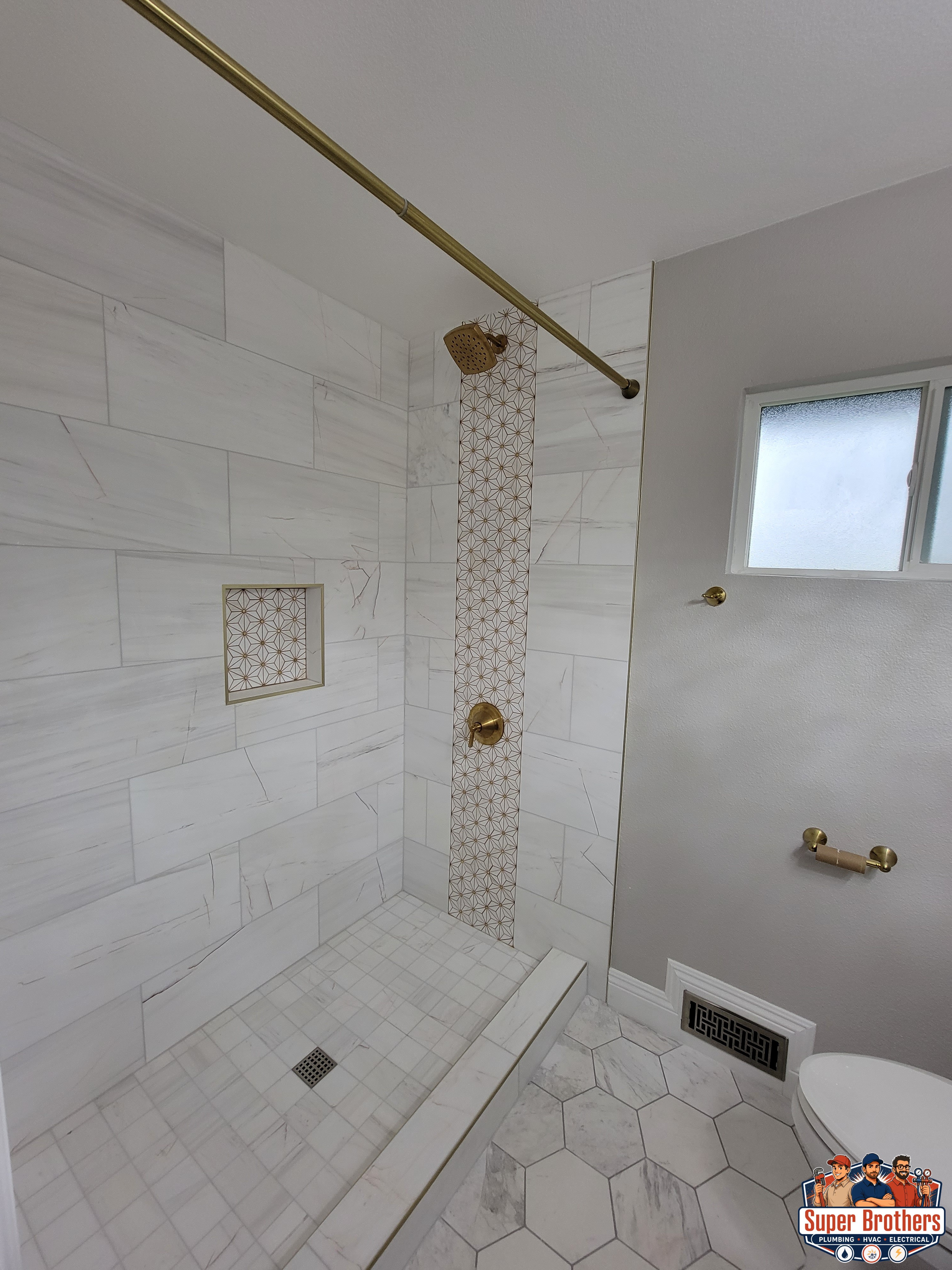 bathroom remodeling with white marble tiles