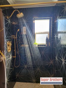 new bathroom remodeling with black marble tiles