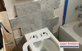 Wall mounted toilet installation