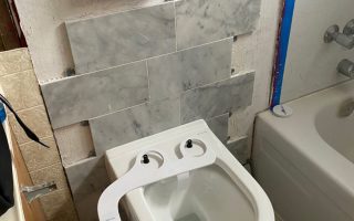 Wall mounted toilet installation
