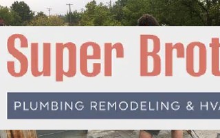 hvac technician cleaning ac condenser on the roof