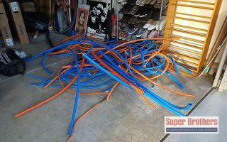 old kitec pipes in a garage