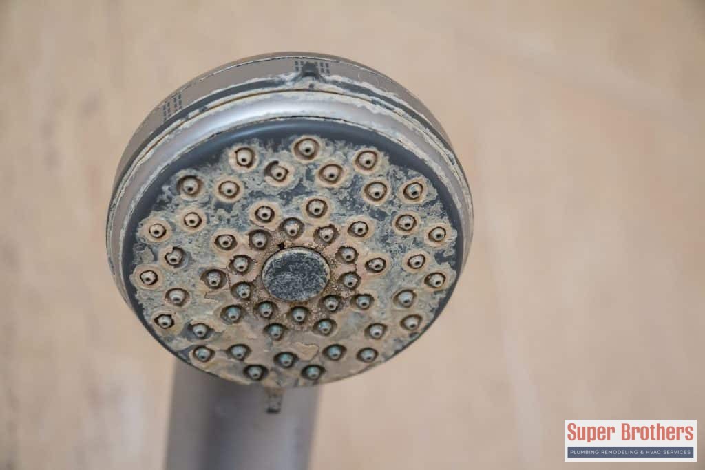 hard water stains on the shower head