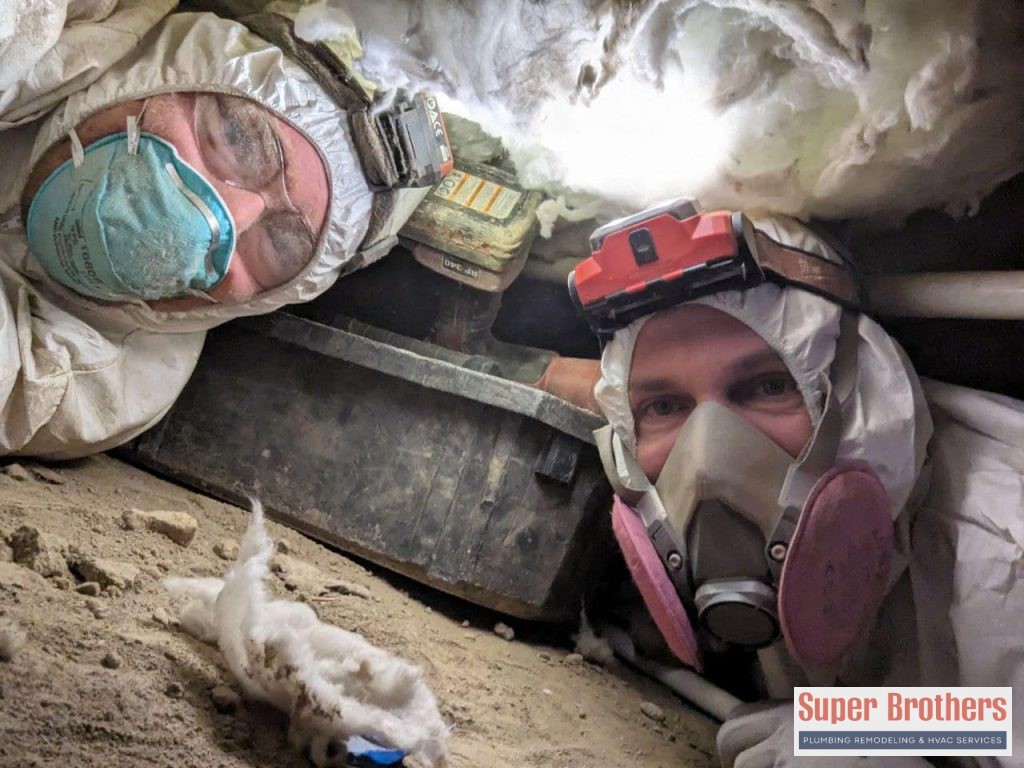 repipe technicians under the house