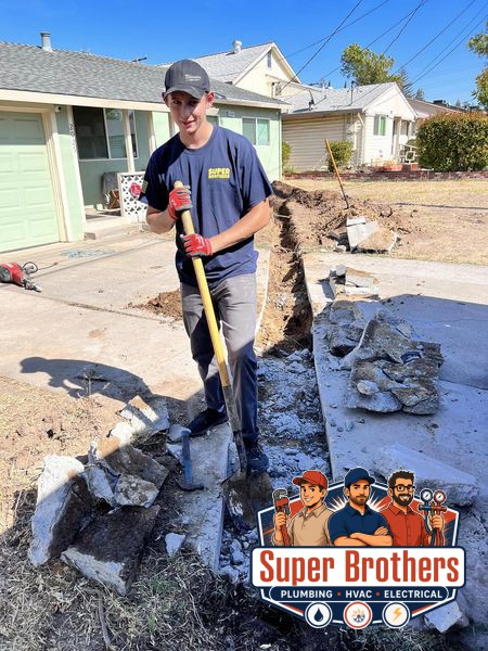 digging the trench for sewer line installation