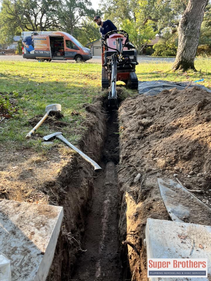 digging trench for sewer line replacement