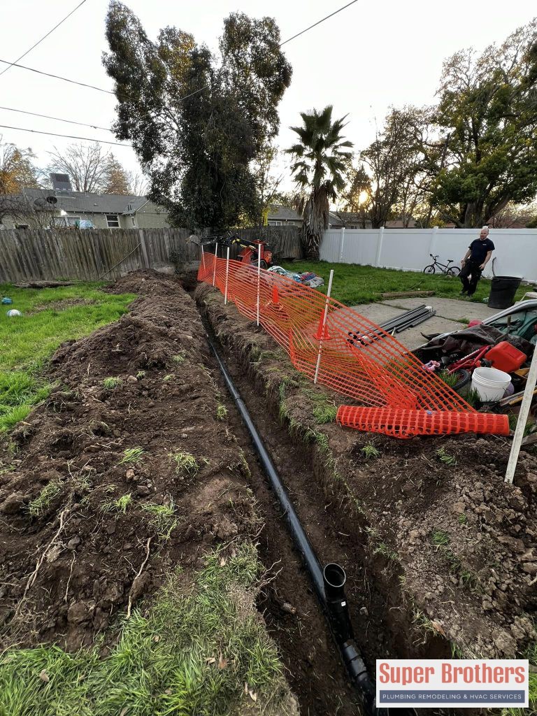 sewer line replacement in the backyard