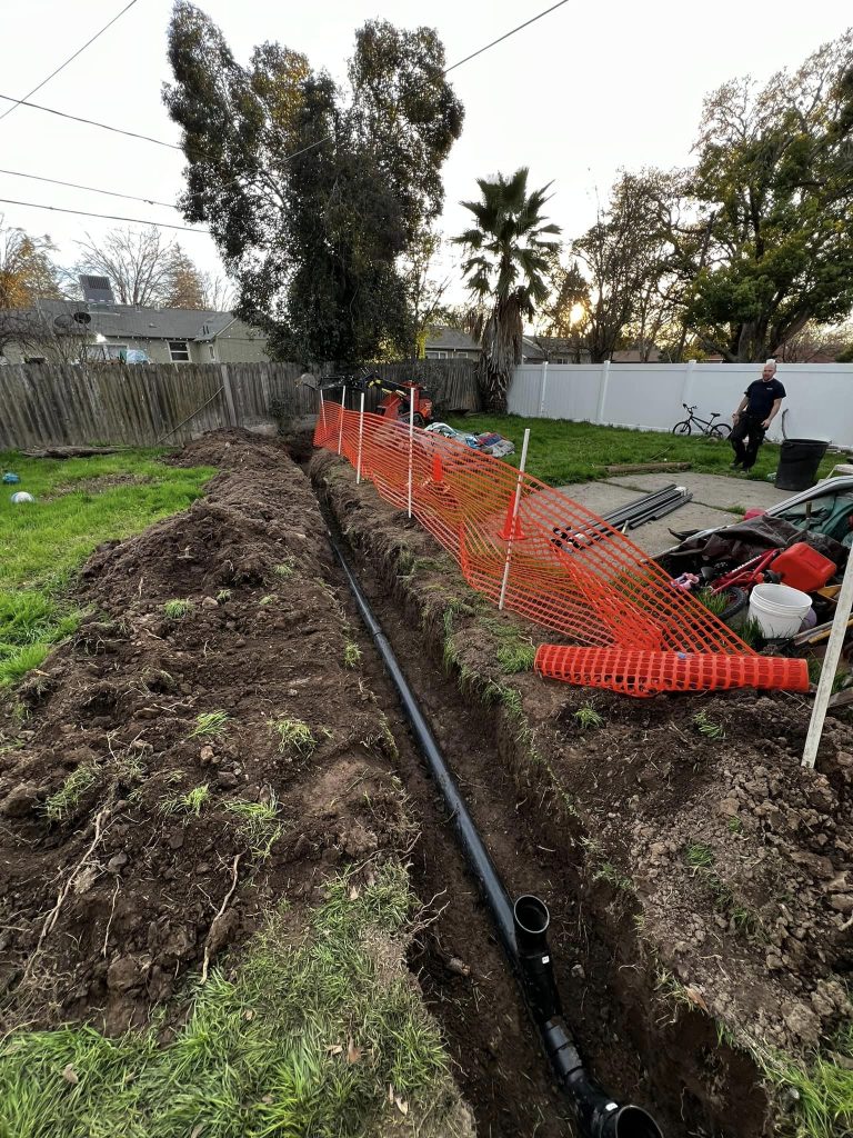 sewer line replacement in the backyard