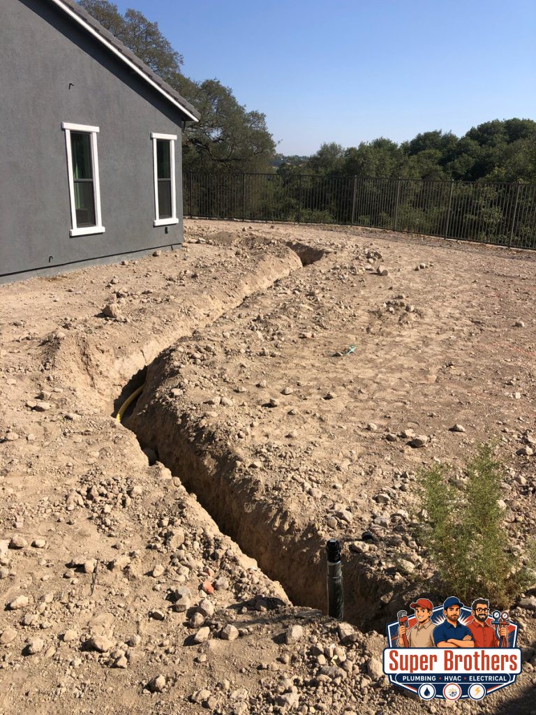 installing new polybutylene pipe for outdoor barbecue