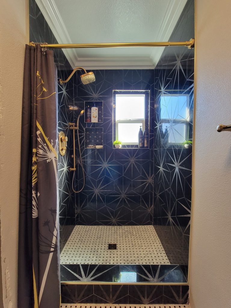 shower installation with marble tiles