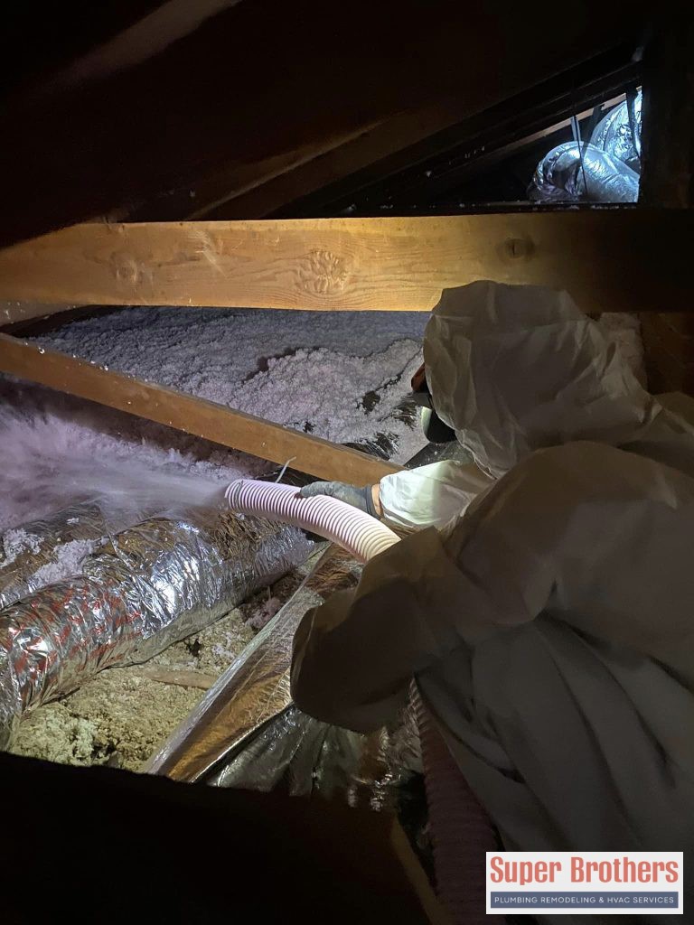 vacuum old non efficient cellulose insulation