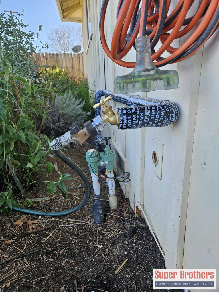 installing a backflow preventer on the spigot