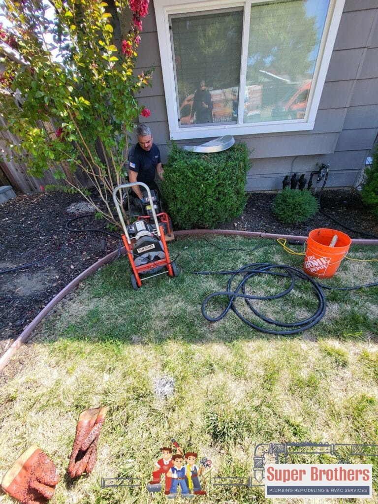 unclogging drain line