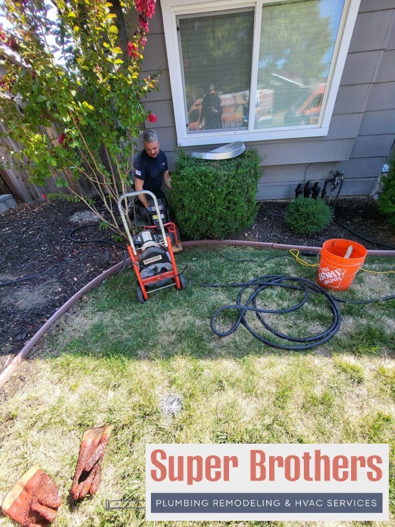 unclogging drain line