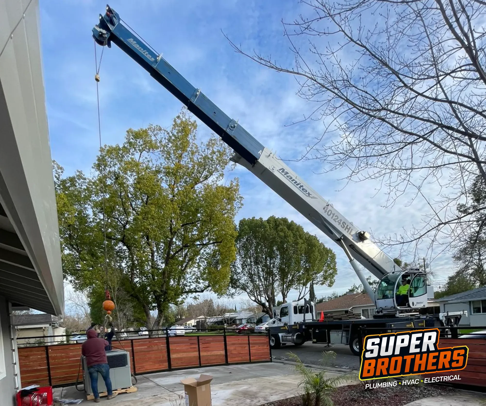 New HVAC system installation with use of crane
