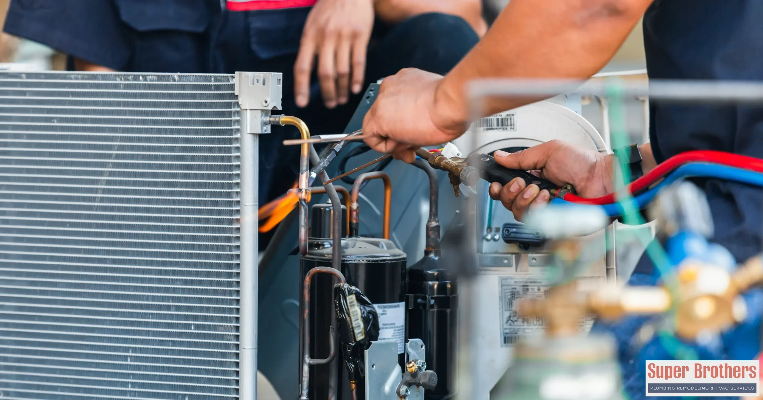 Technician checking a wall mounted mini split indoor unit in a Sacramento home