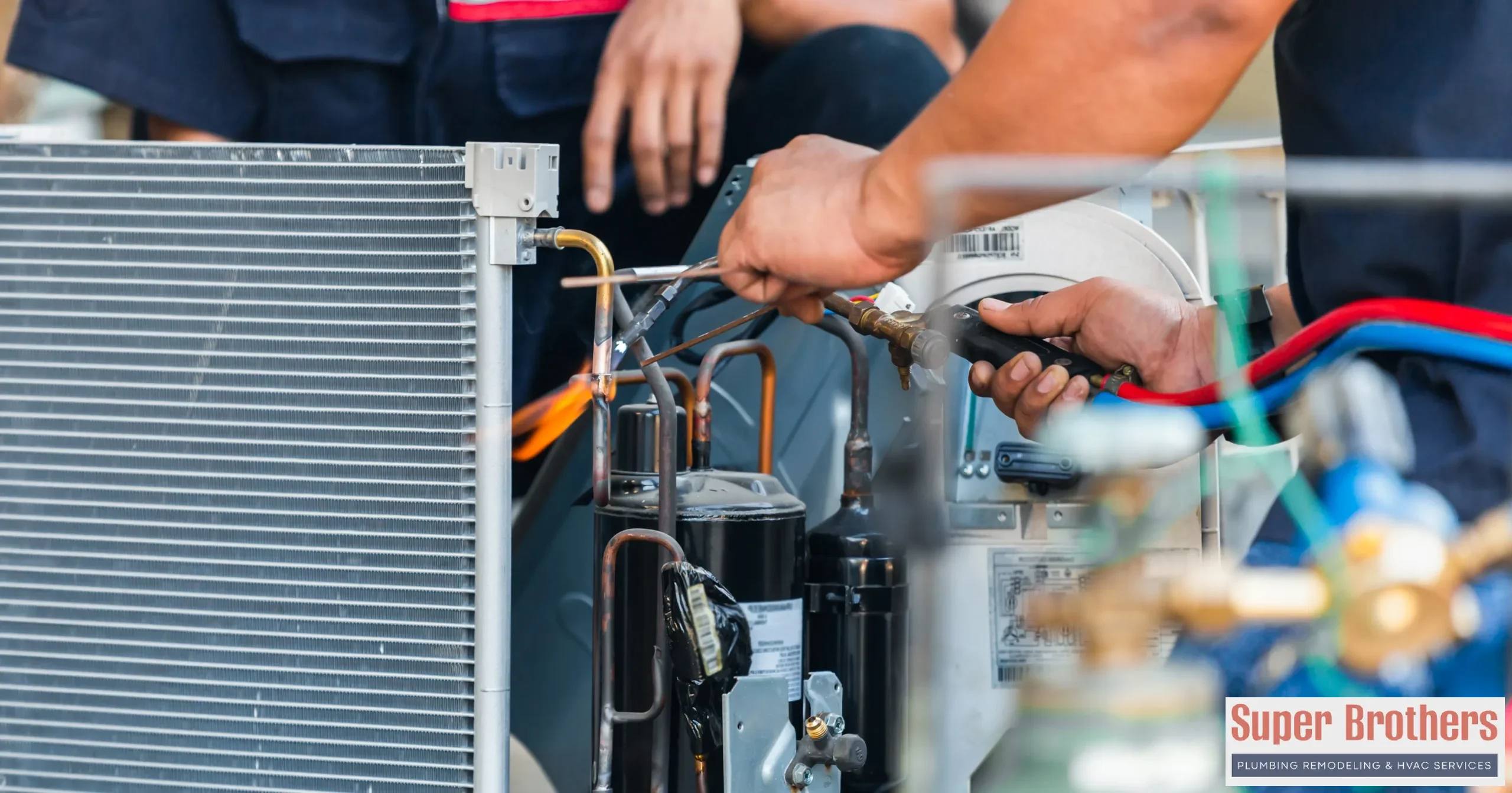Technician checking a wall mounted mini split indoor unit in a Sacramento home