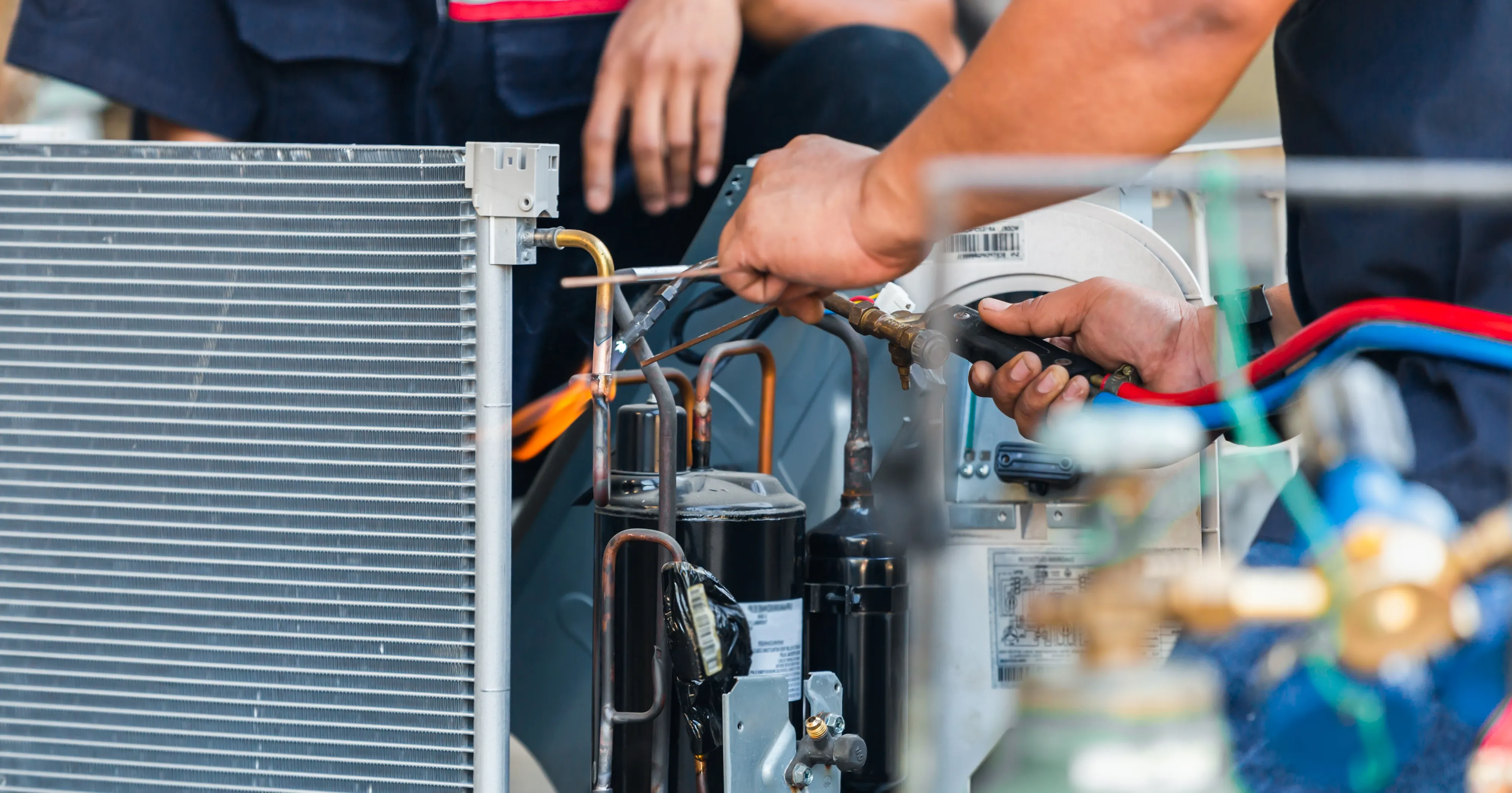 HVAC technician checking a home heating and air conditioning system