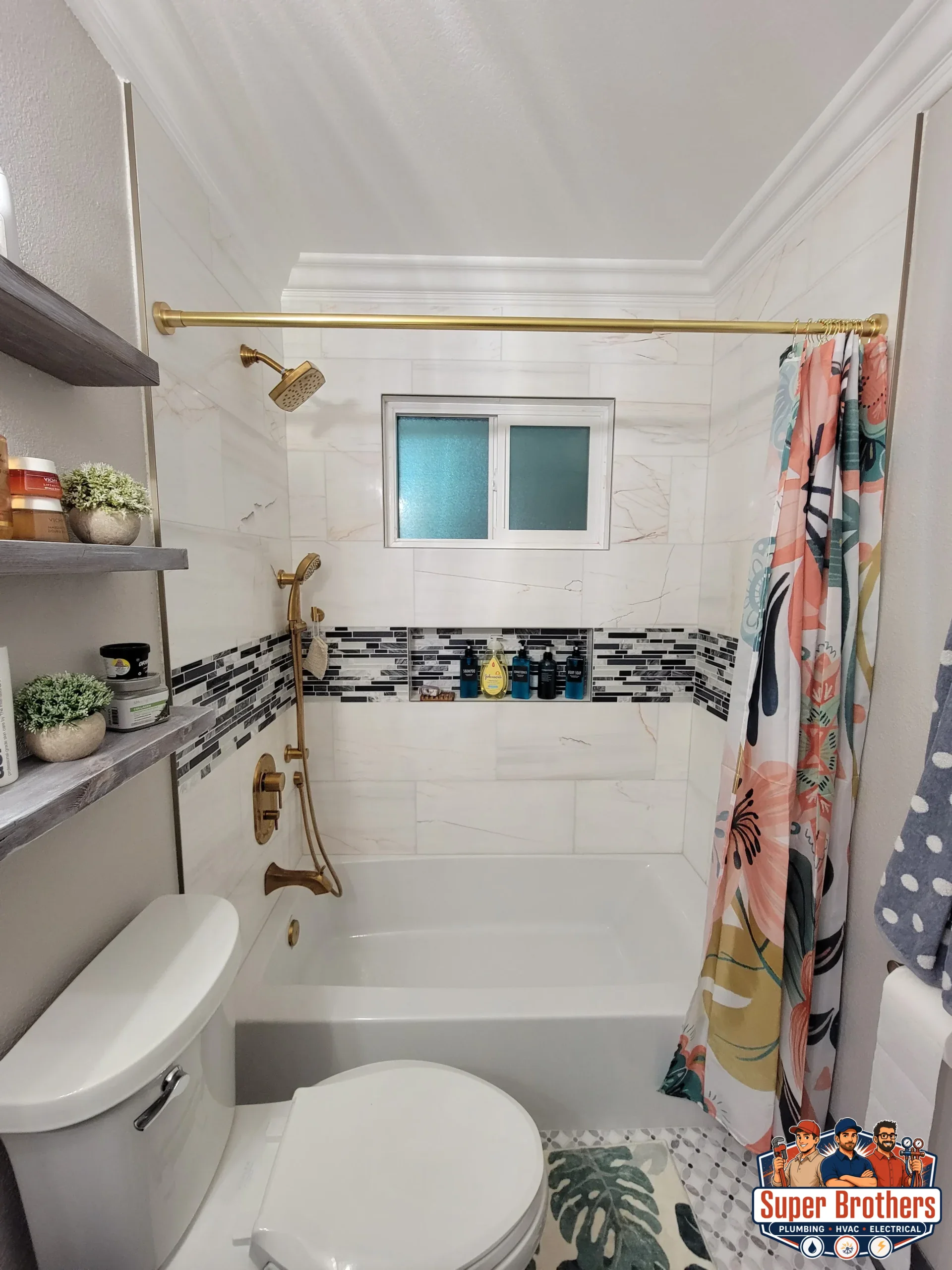Bright modern bathroom with simple white vanity and black hardware