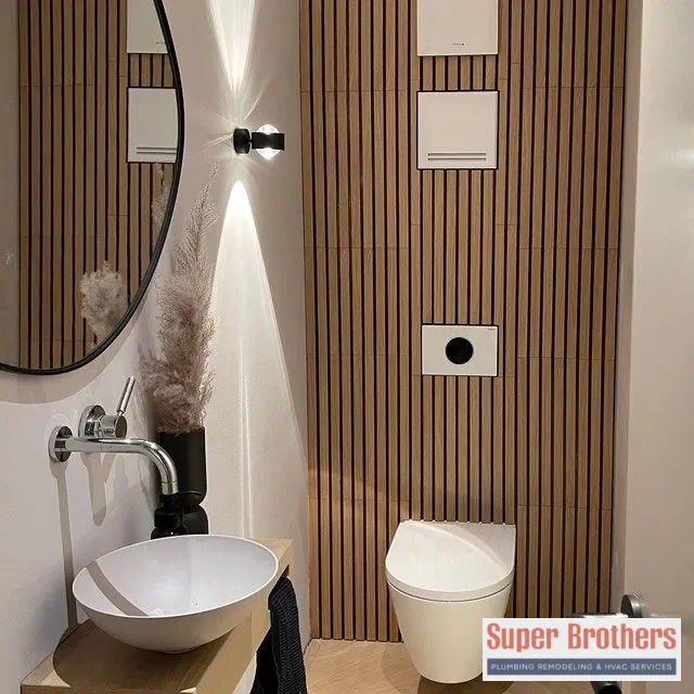 Plumber checking a toilet in a Sacramento bathroom