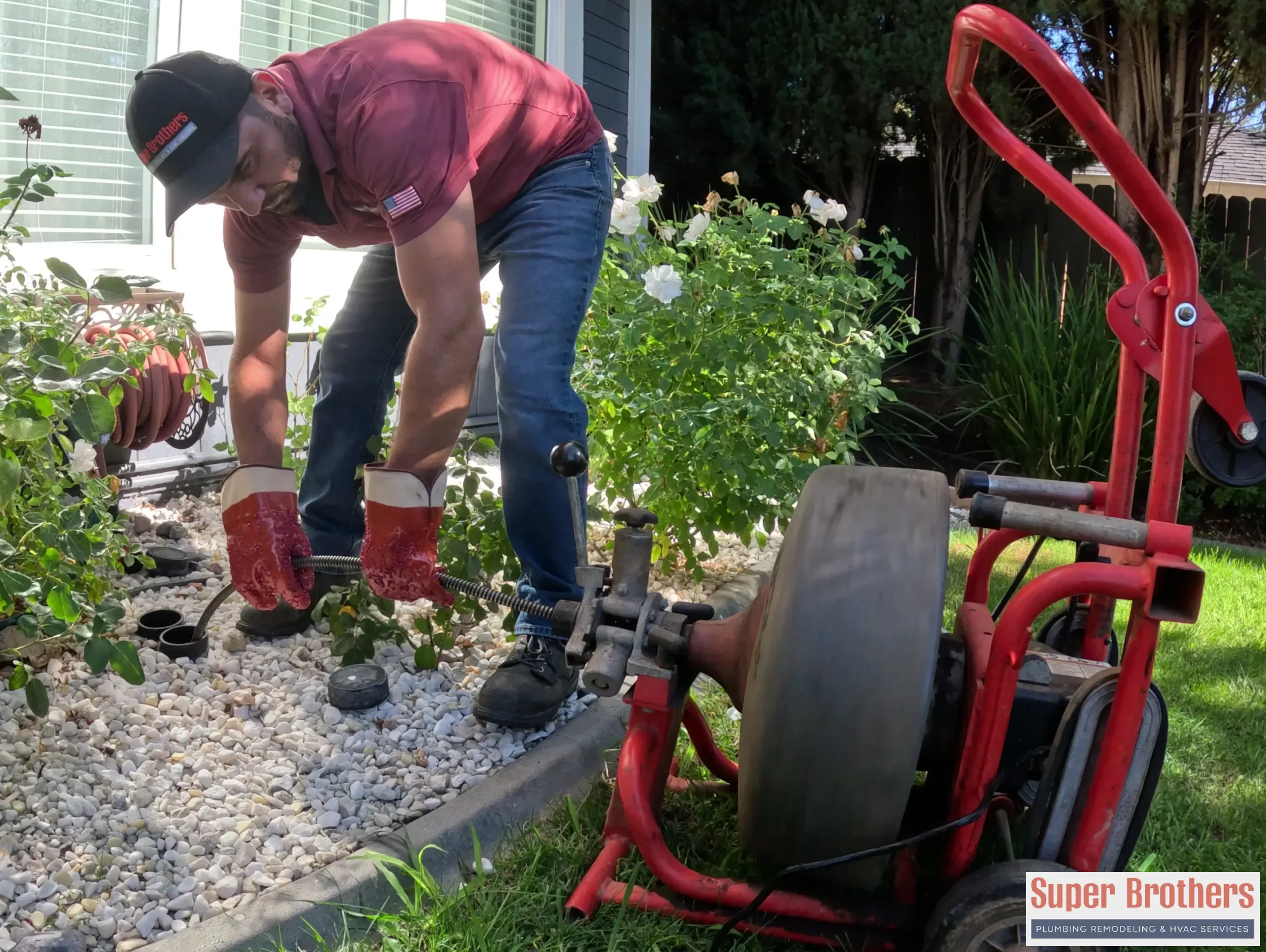 Plumber performing slab leak detection with acoustic equipment in a Sacramento home