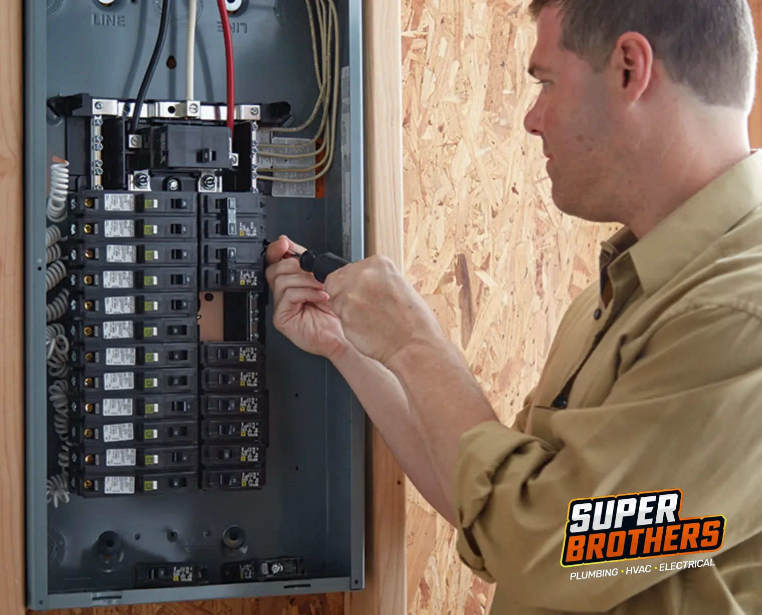 Licensed electrician inspecting a residential panel in Northern California
