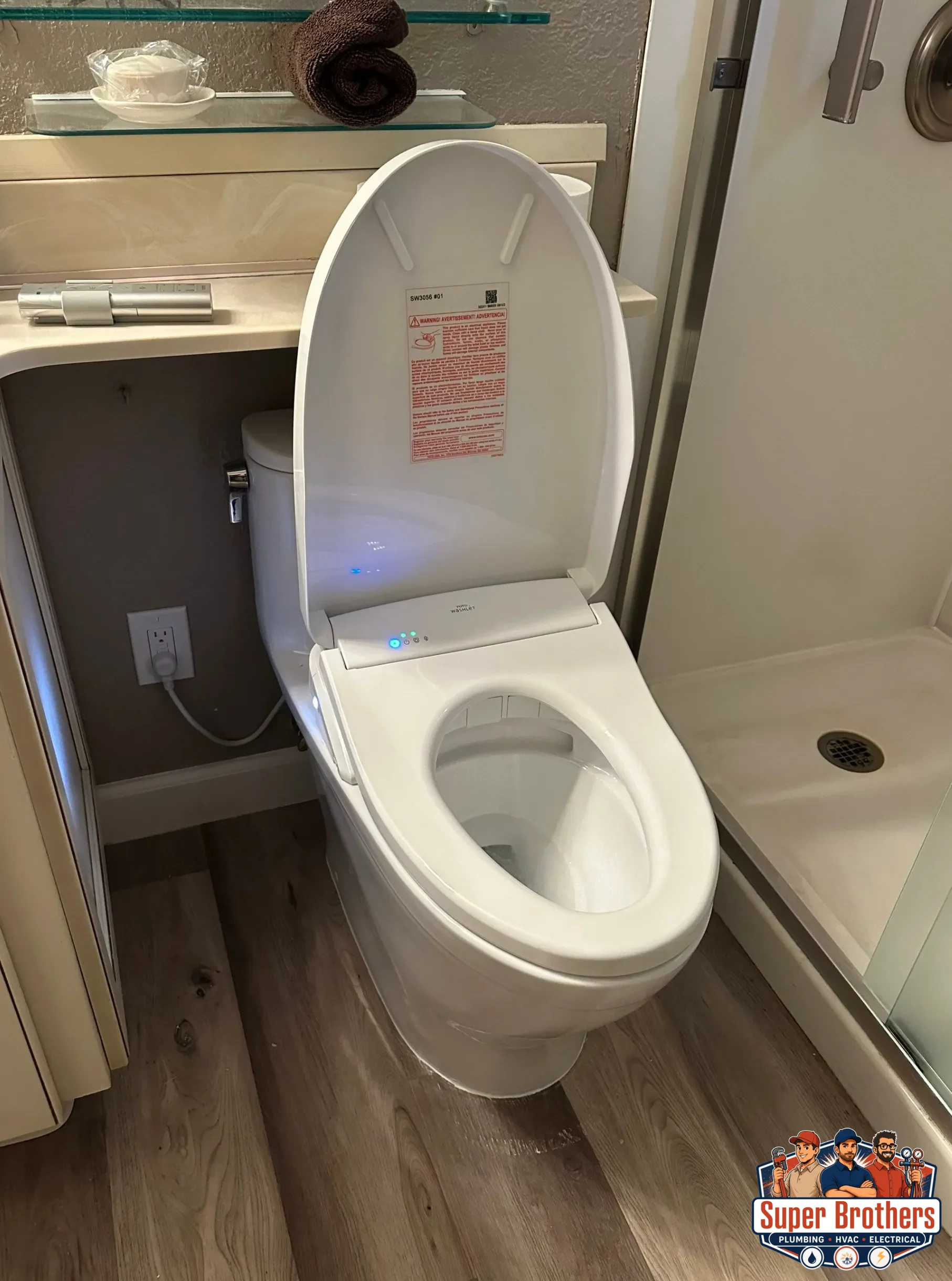 Open toilet tank showing flapper and fill valve parts