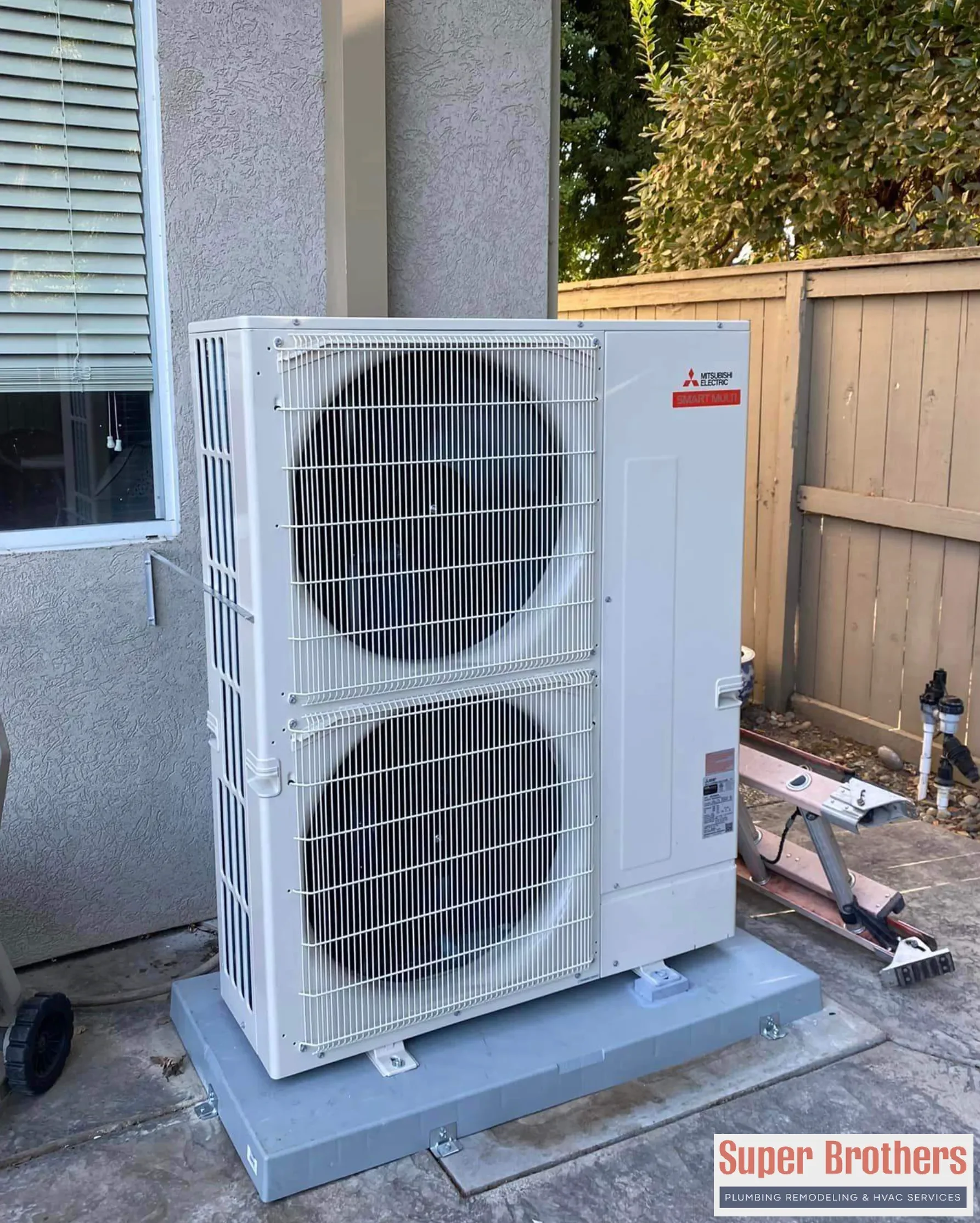 Outdoor mini split condenser installed beside a Sacramento area home