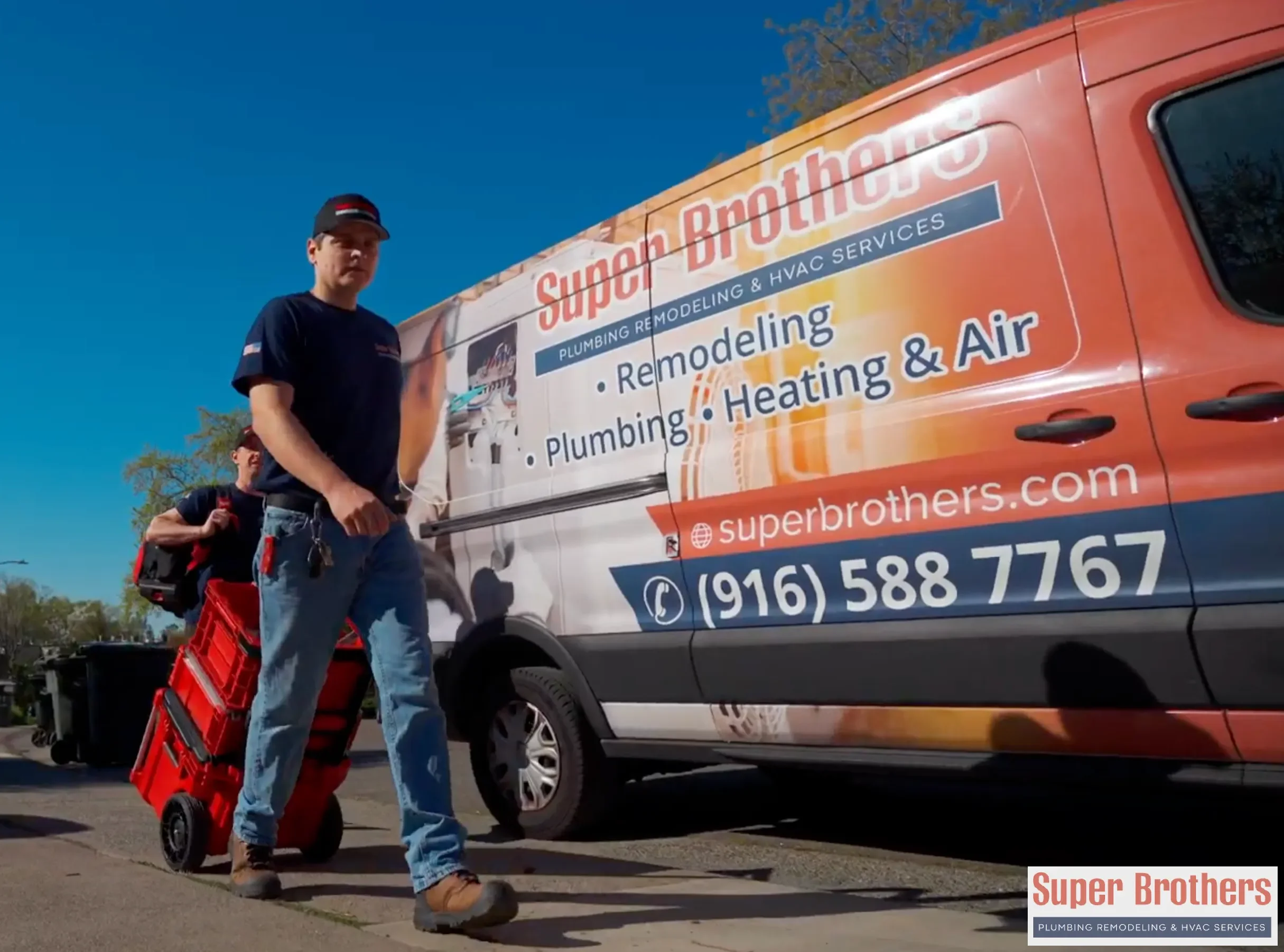Homeowner and plumber reviewing completed repipe work and shutoff valves