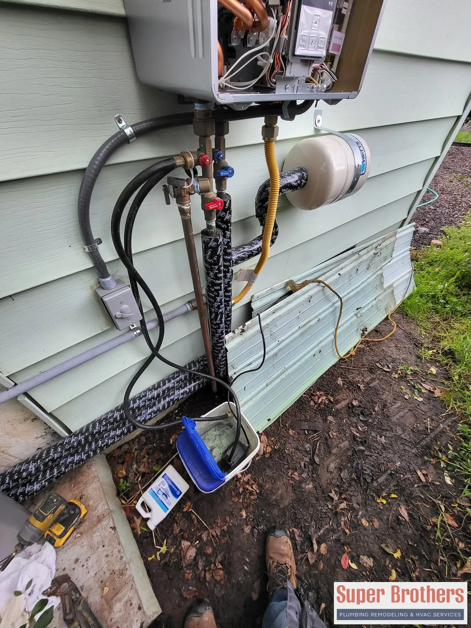 Technician performing annual descaling and filter cleaning