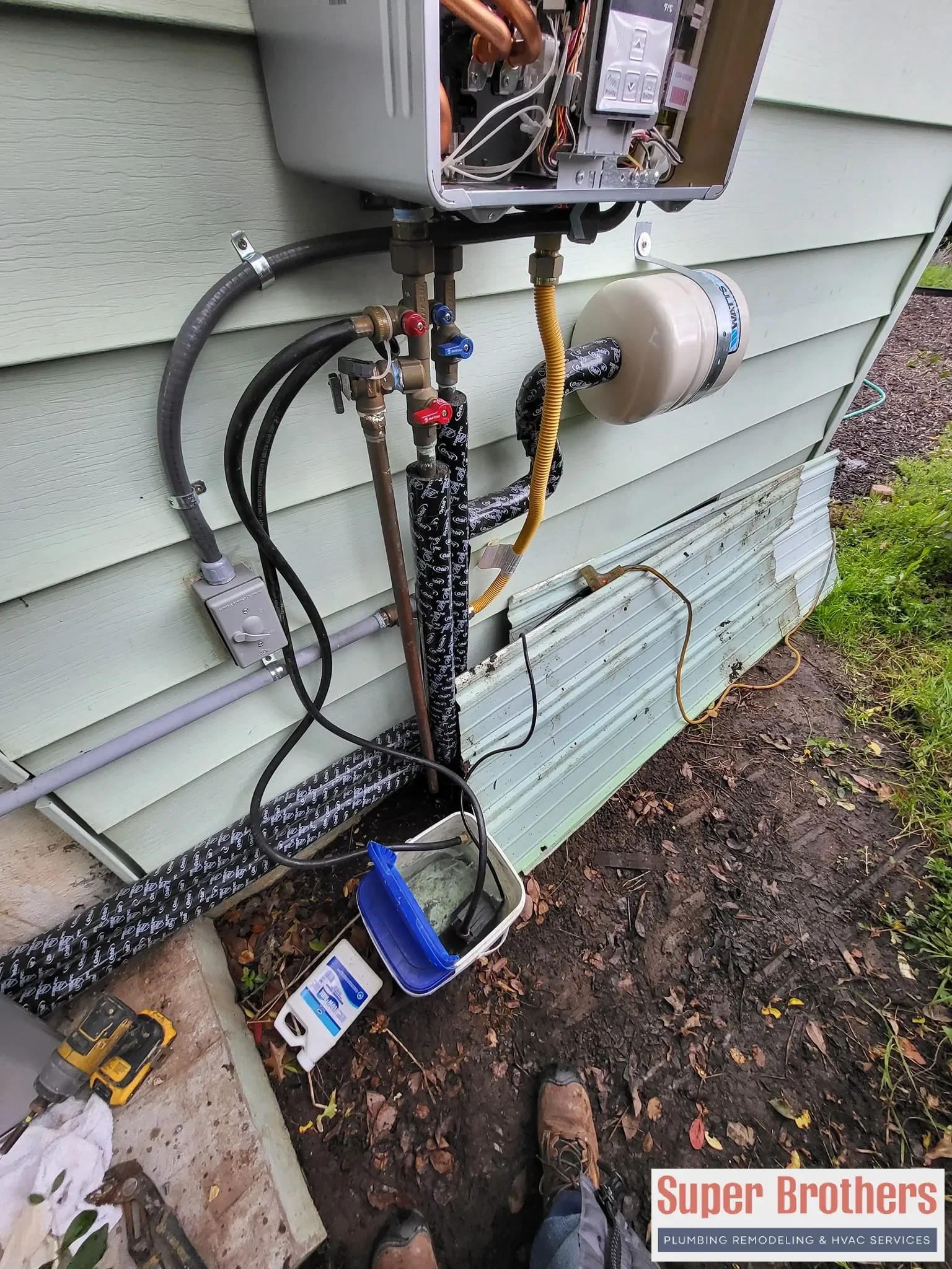 Technician performing annual descaling and filter cleaning