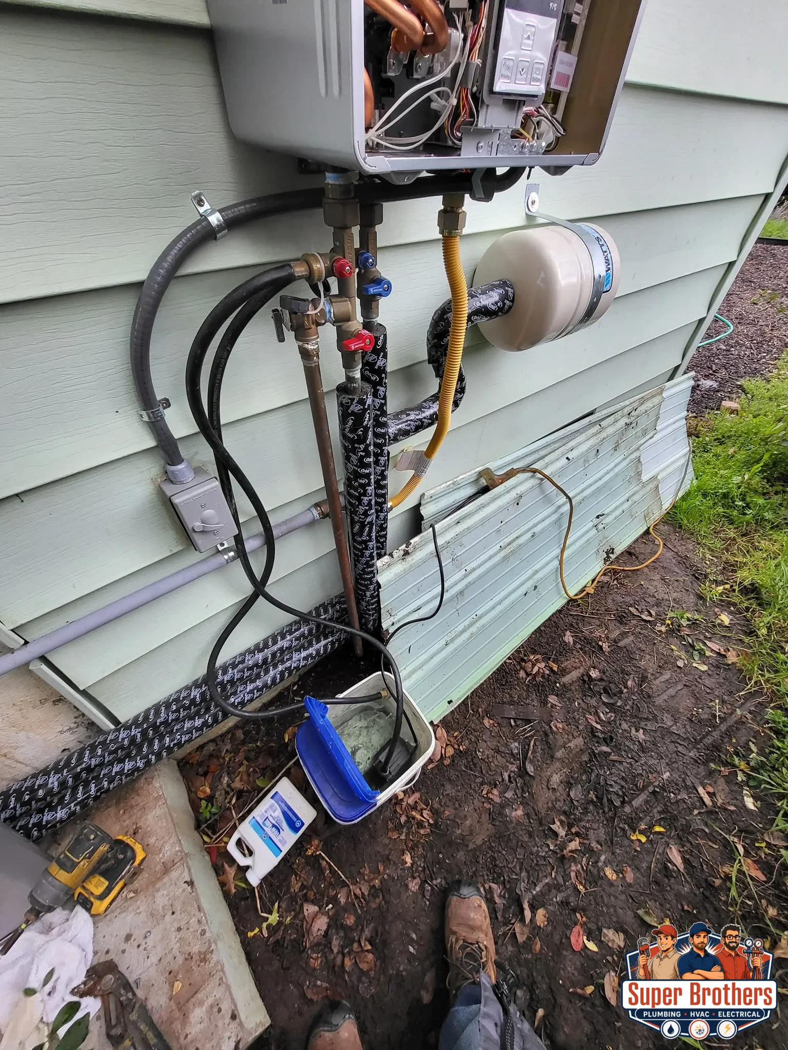 Technician performing annual descaling and filter cleaning