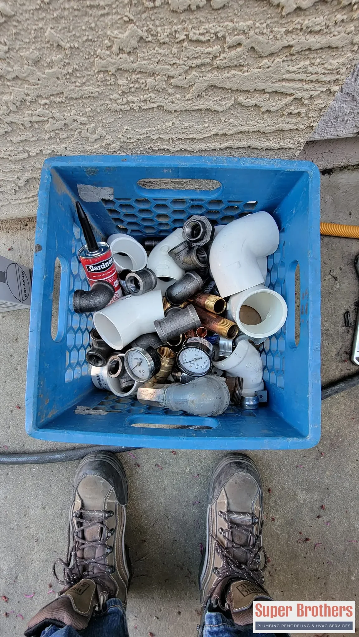 Super Brothers plumber discussing slab leak repair options with a Sacramento homeowner