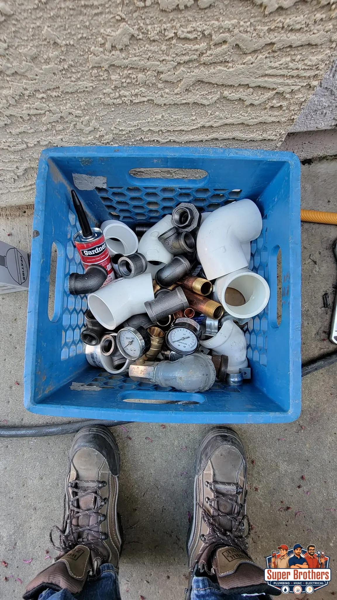 Super Brothers plumber discussing slab leak repair options with a Sacramento homeowner
