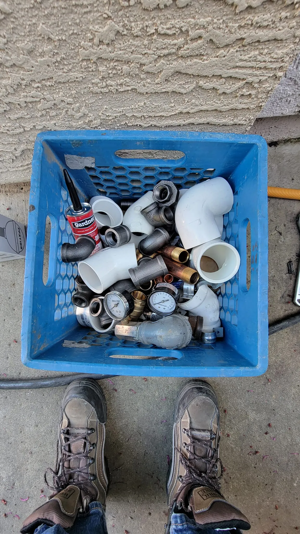 Super Brothers plumber discussing slab leak repair options with a Sacramento homeowner