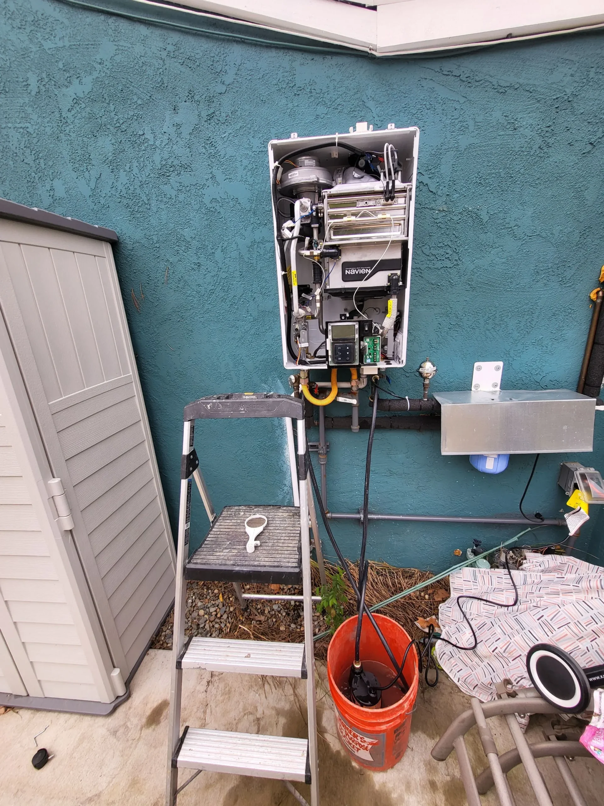 Step-by-step retrofit: isolation valves, service tees, condensate neutralizer