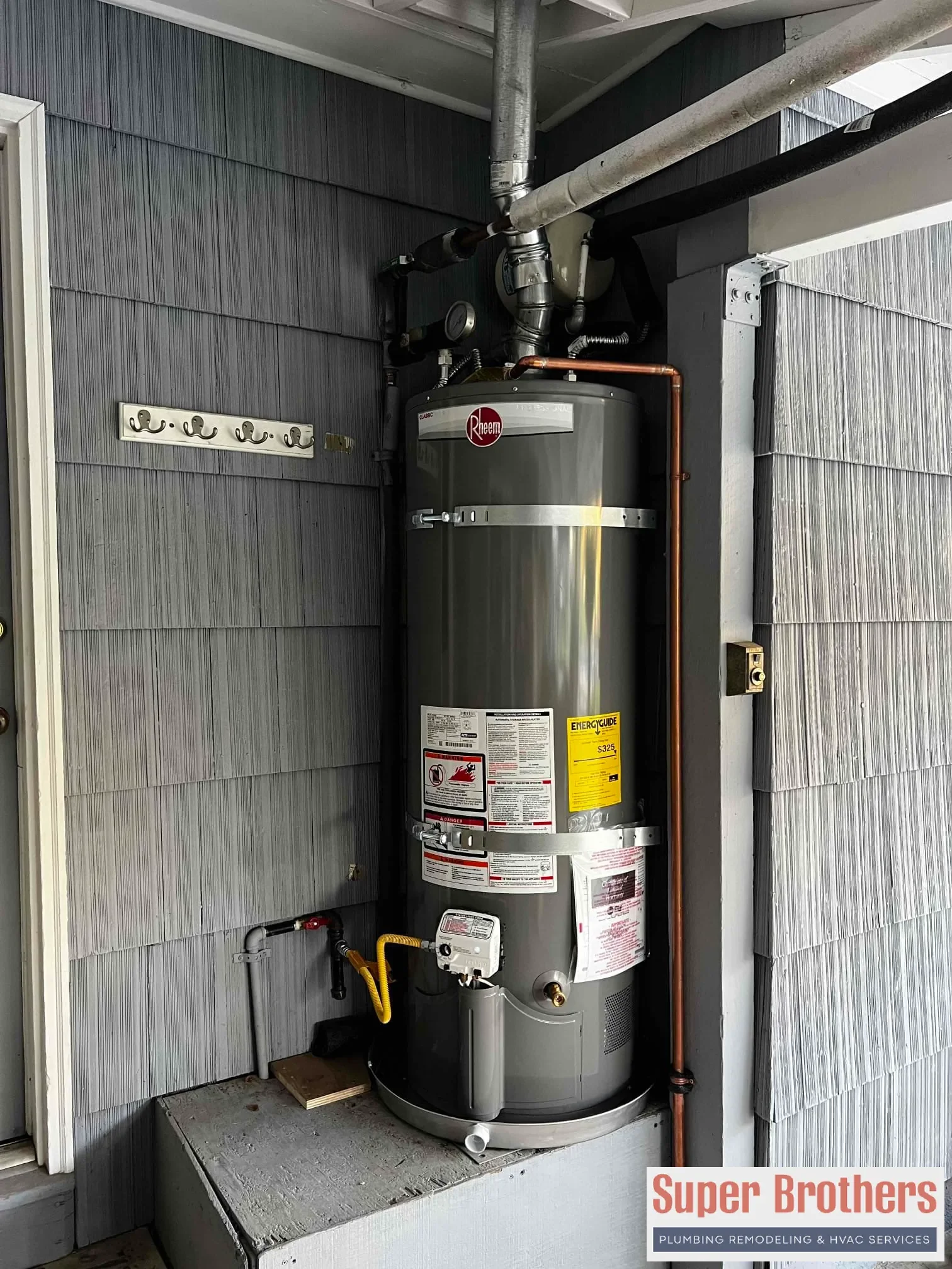 New water heater installation with seismic straps and permit-ready setup in California