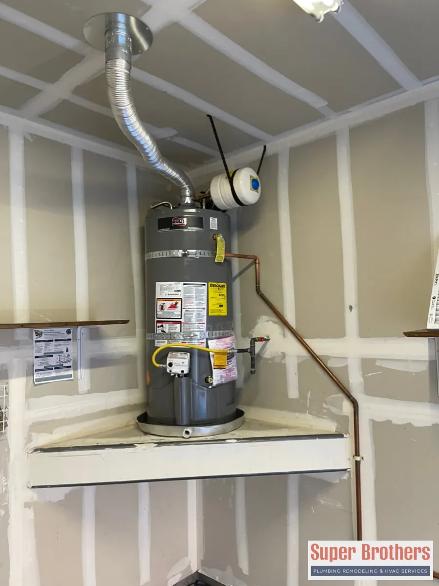 A modern water heater installed cleanly in a Sacramento home garage
