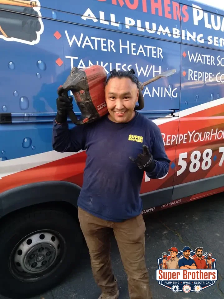 Licensed plumber performing a whole‑home plumbing inspection