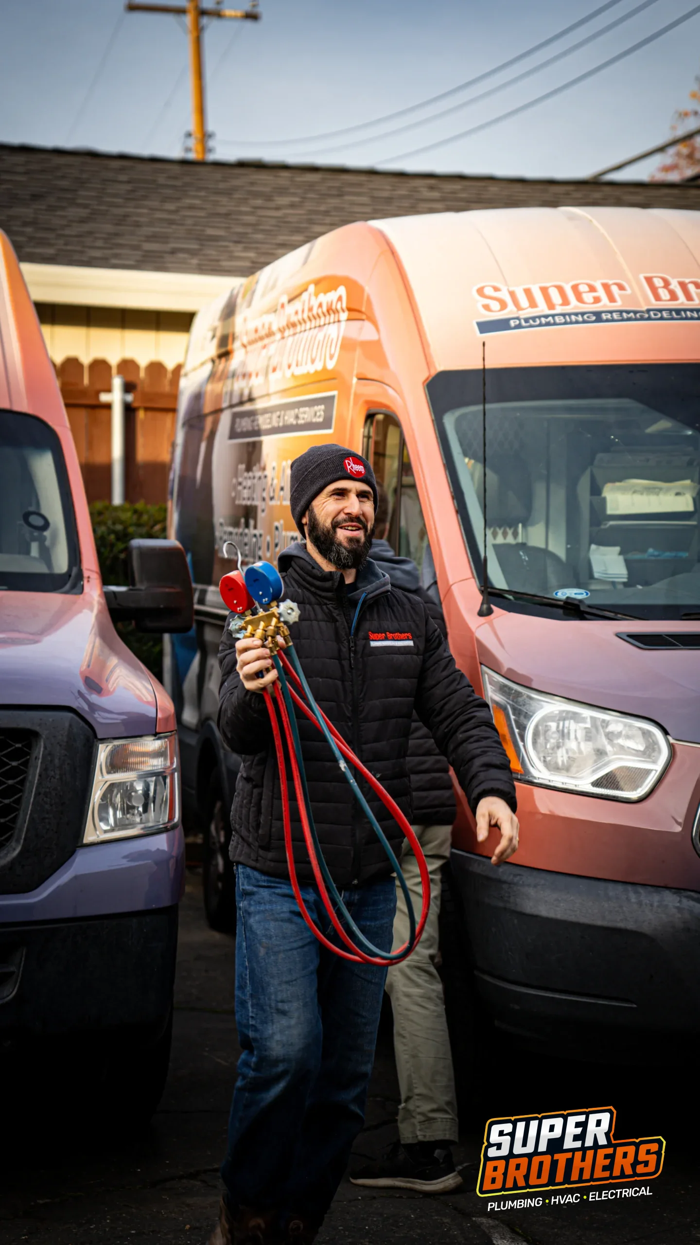 Super Brothers Technician walking with ac refill meter during a repair visit