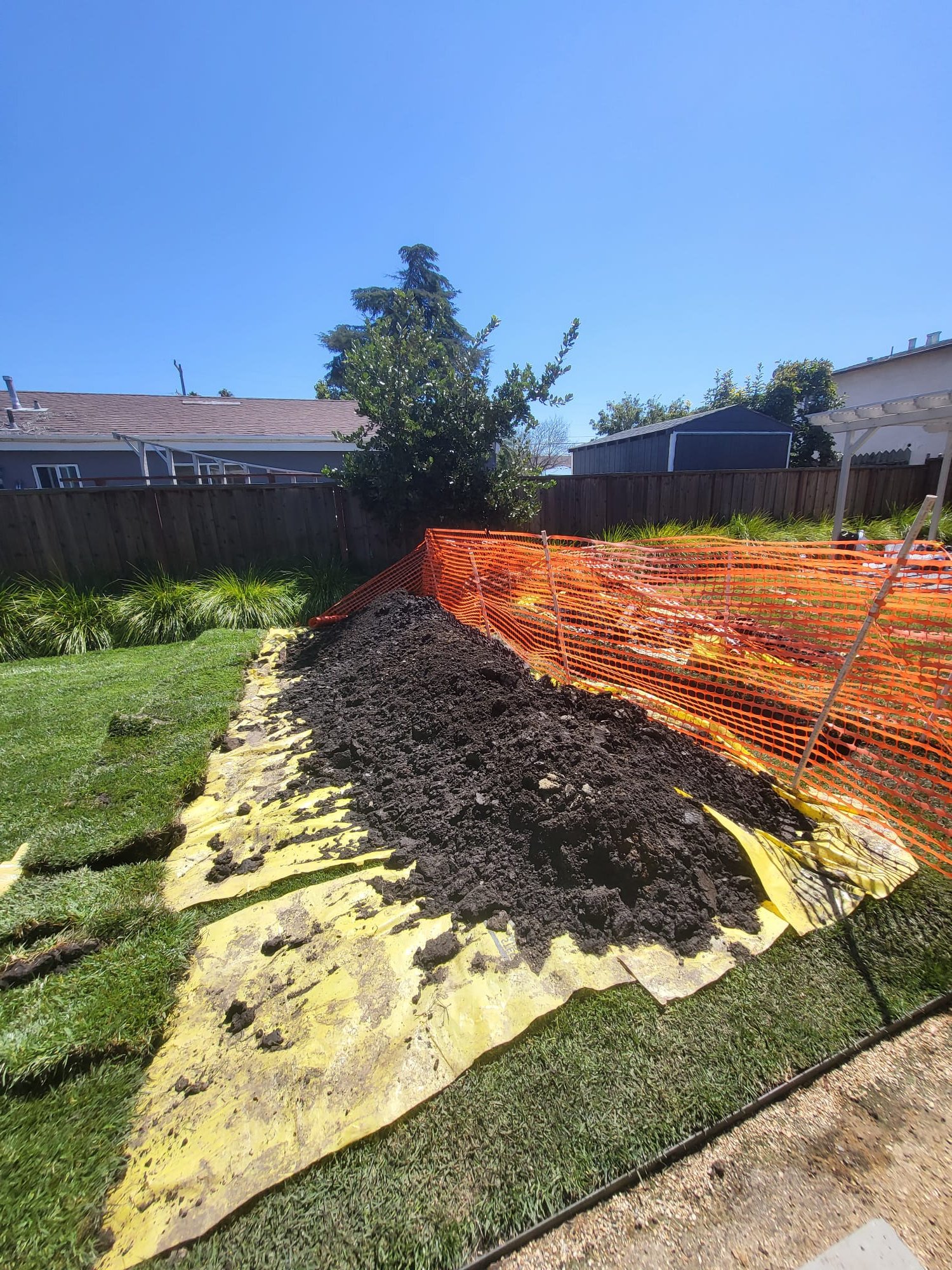 dug up yard for drain line replacement