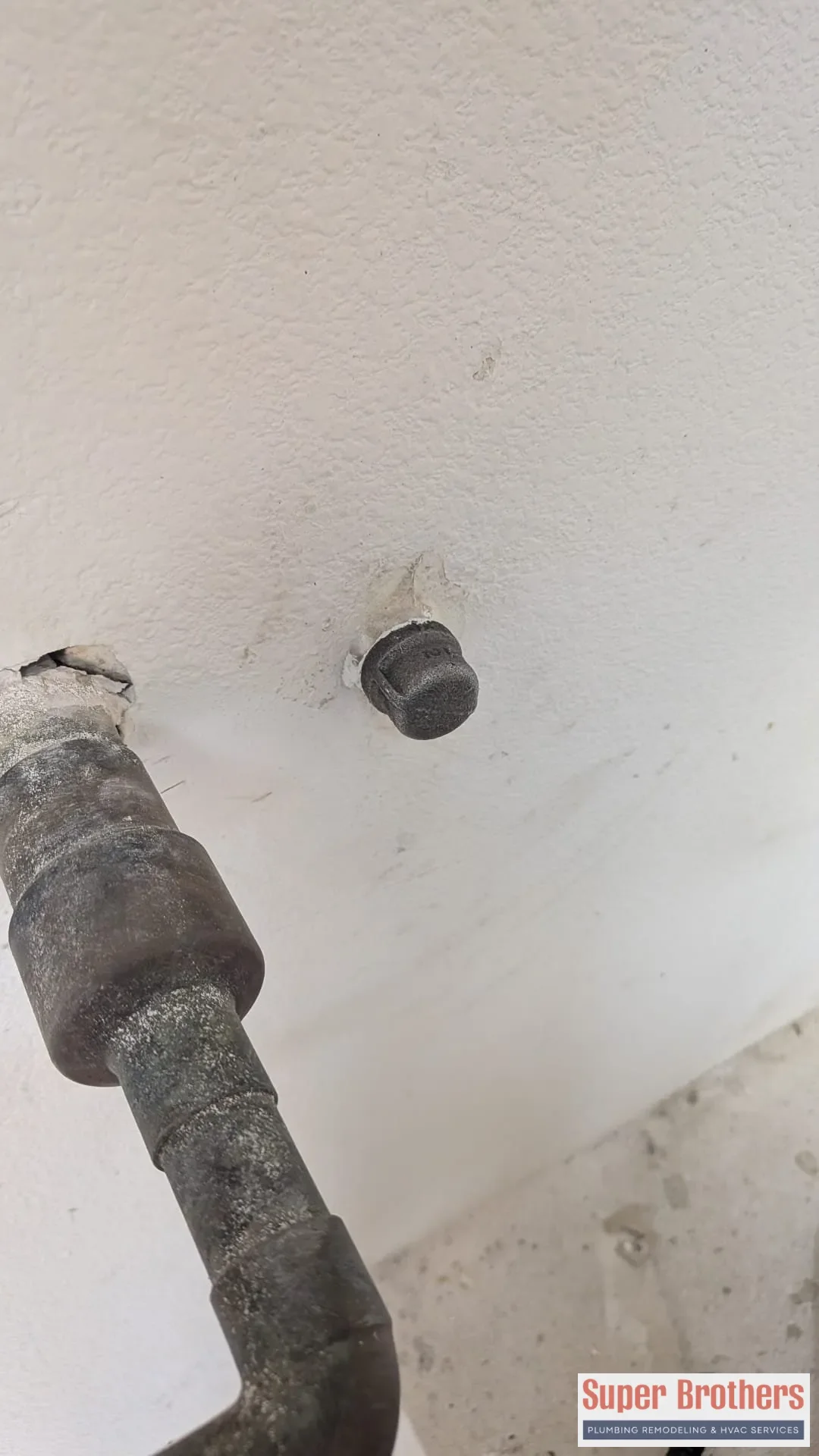 water heater gas line connection capped off in prep for heat pump installation